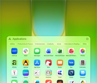 MacBook Neo screen with Applications window containing a wide variety of apps